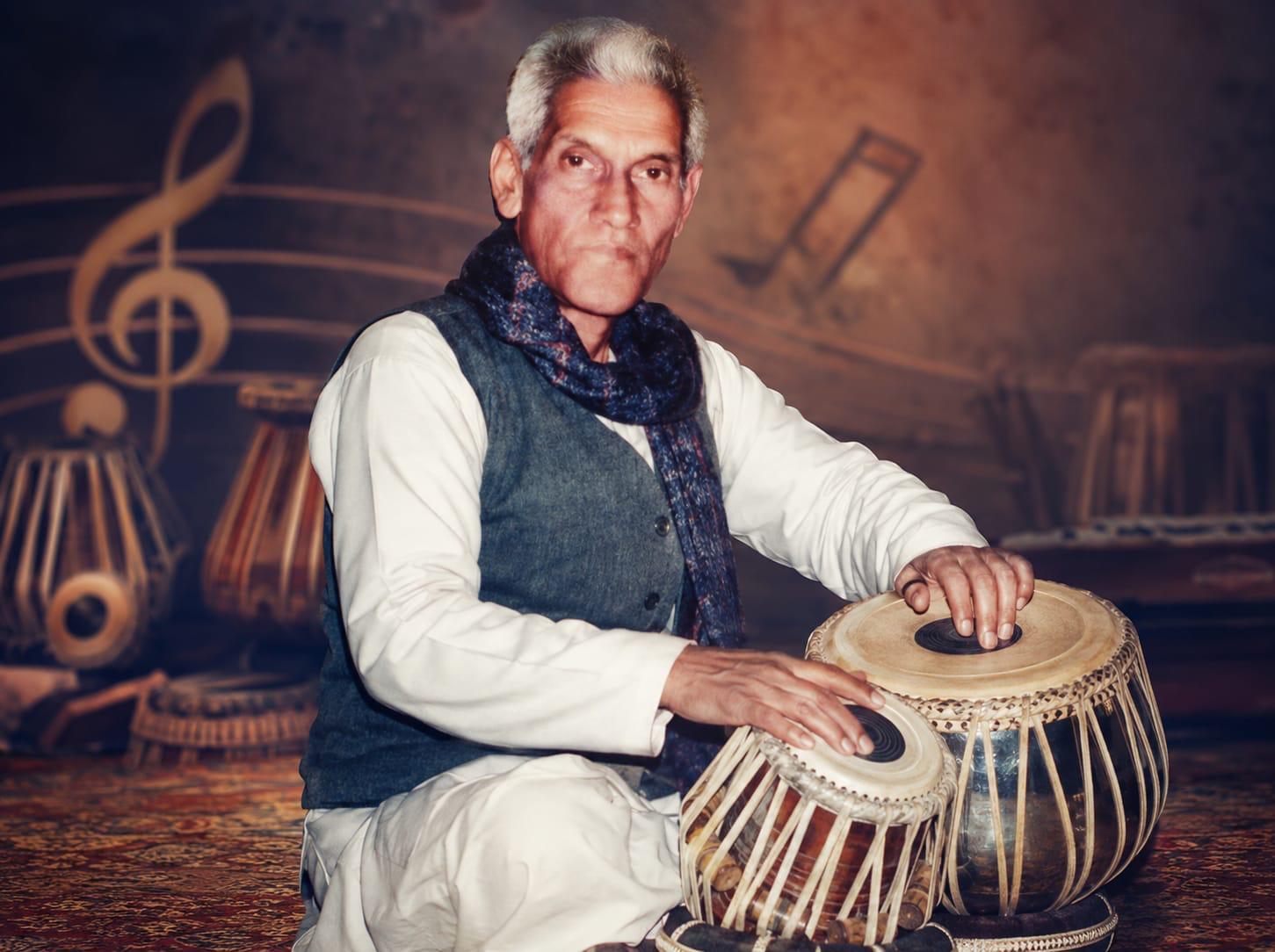 Late Pt. Ganesh Maharaj seated at the tabla